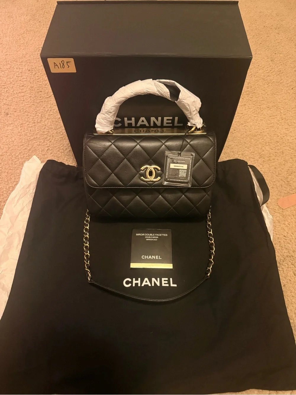 New CHANEL Black Quilted Leather Mini Top Handle Bag with Gold Hardware